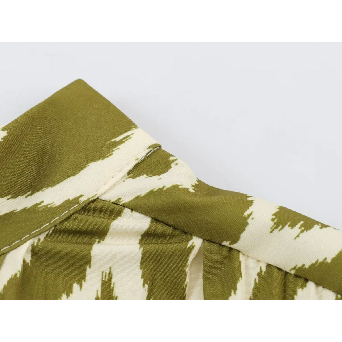 Close-up of high collar stitching detail