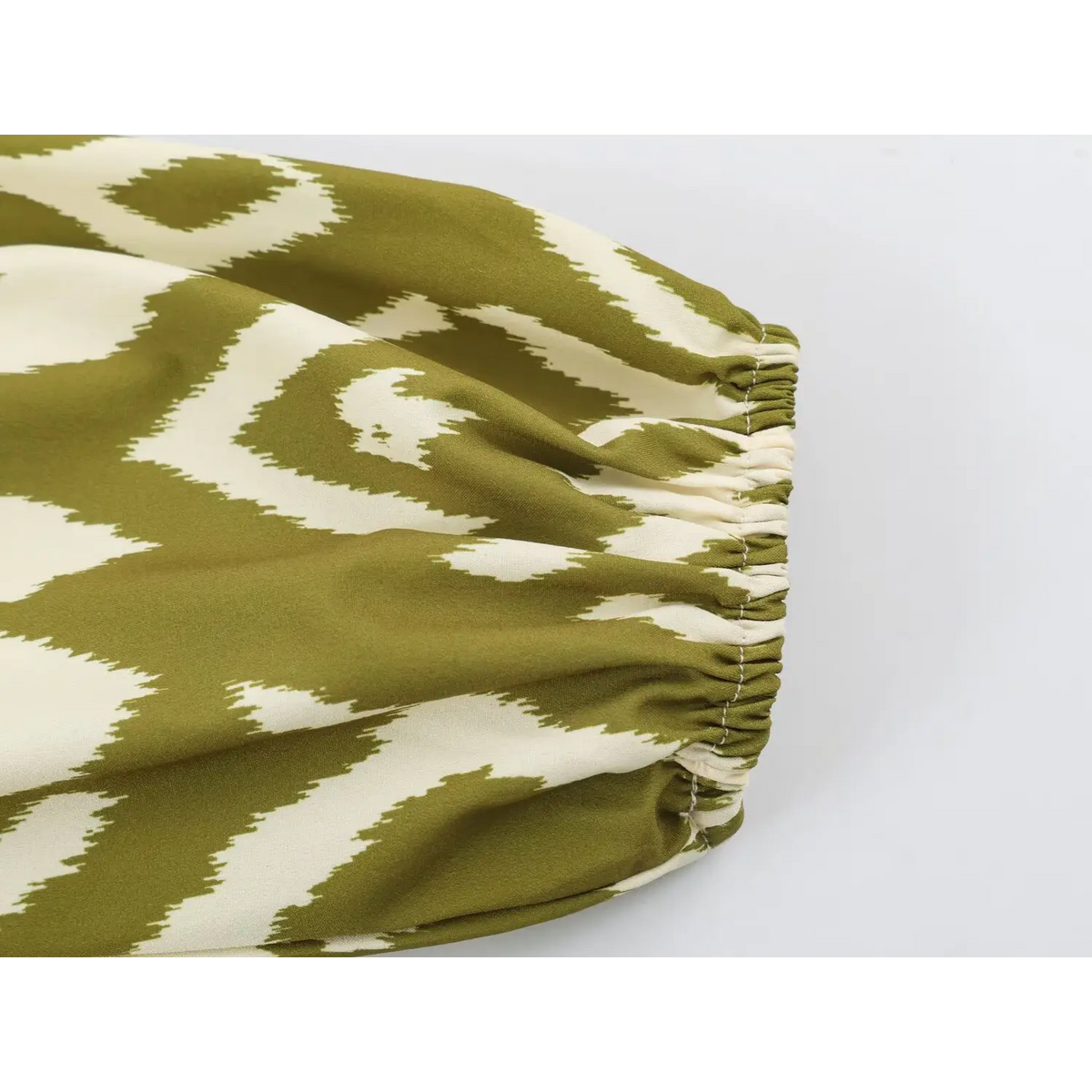 Close-up of elasticated puff sleeve cuff