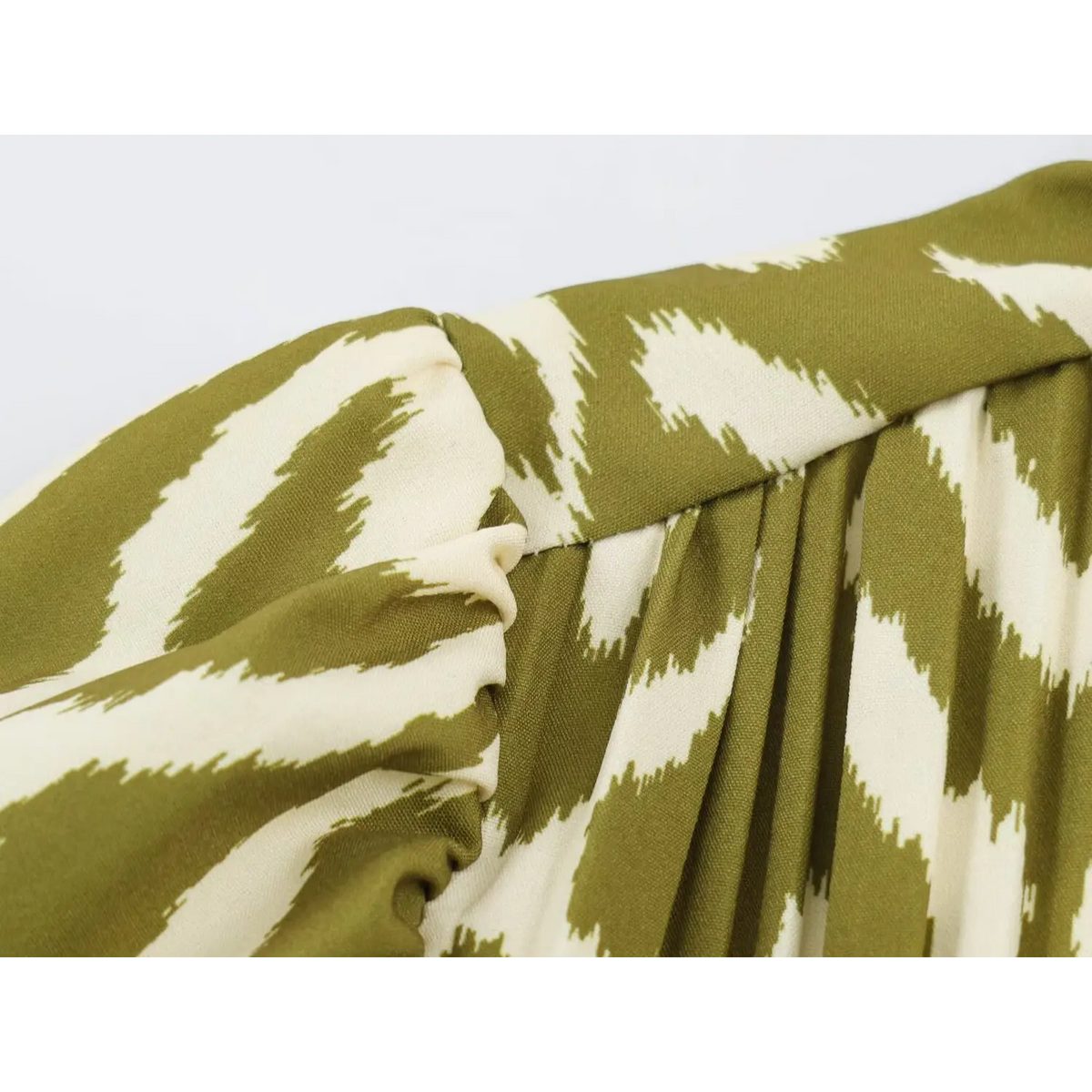Close-up of shoulder gather and ikat print fabric