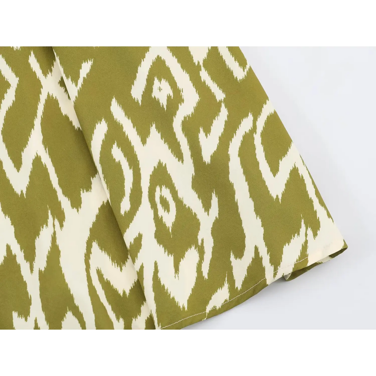 Close-up of straight midi hem edge