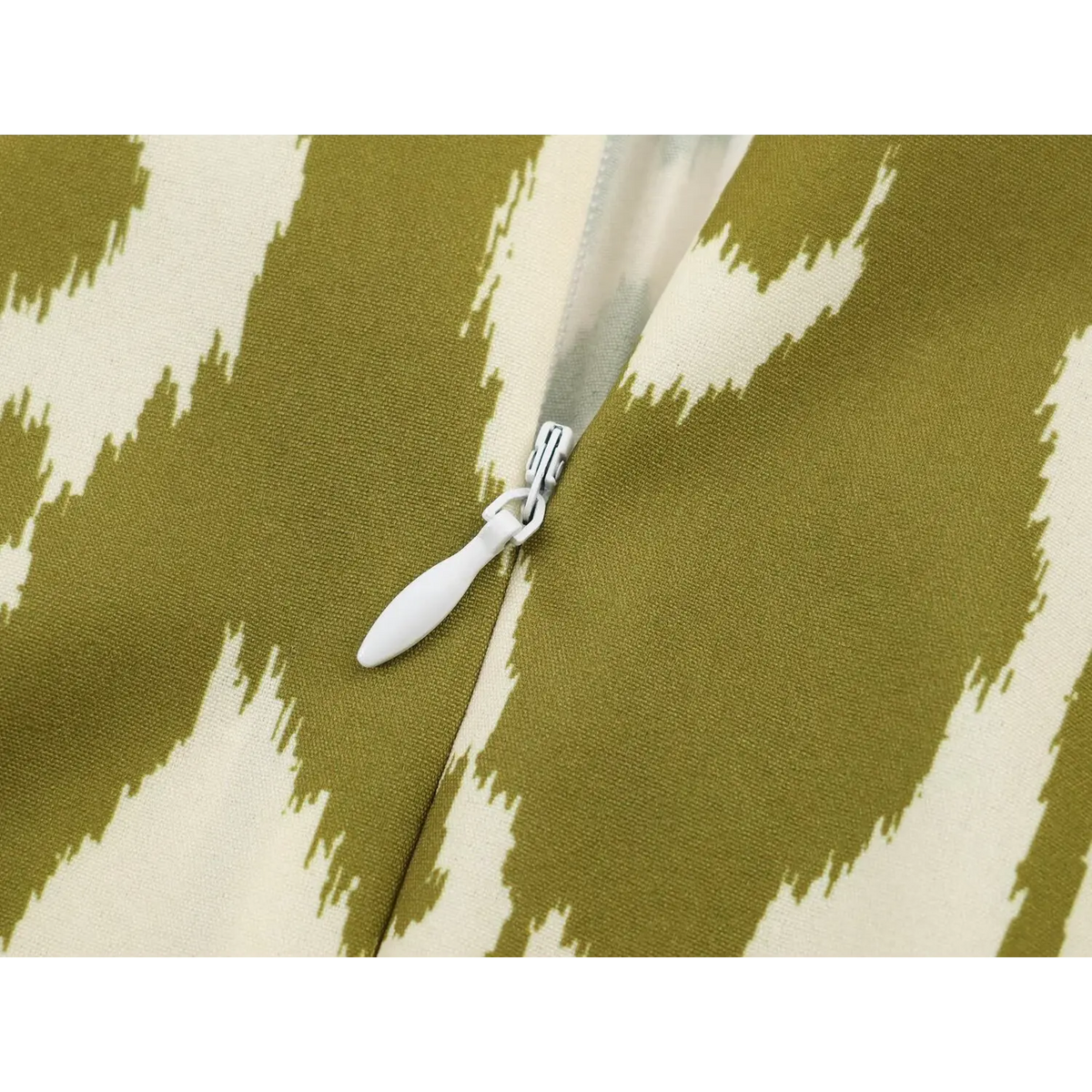 Close-up of back zipper pull detail