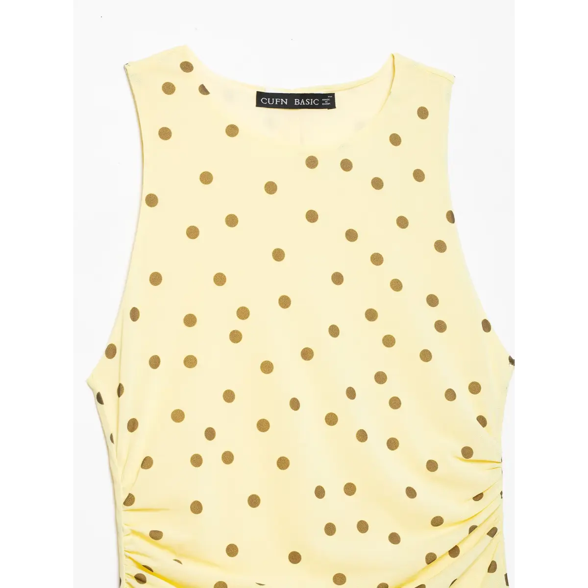  Inner solid yellow lining underneath semi-sheer polka dot chiffon skirt