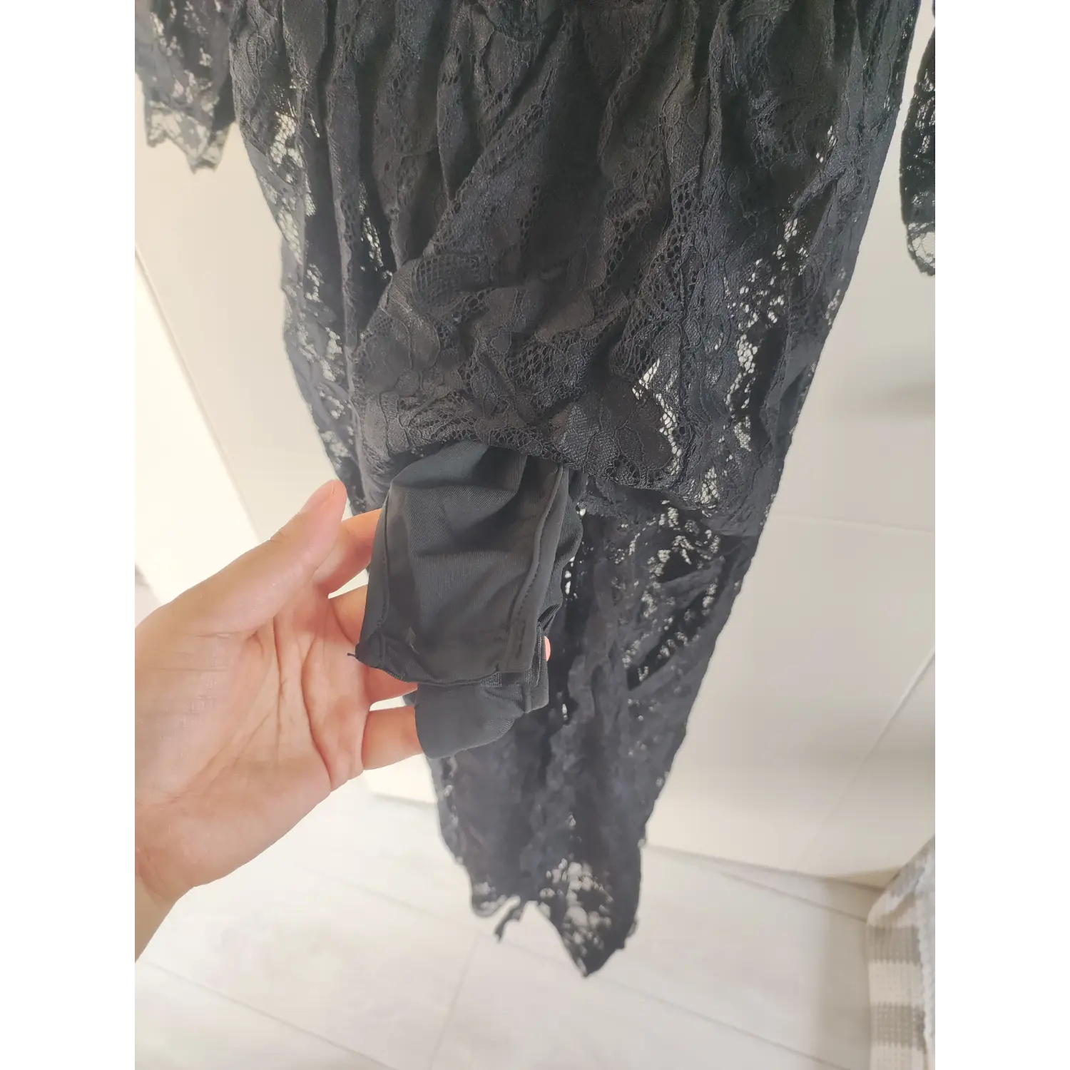 Built-in solid black inner lining at skirt hem, sheer outer lace maxi dress | Detail