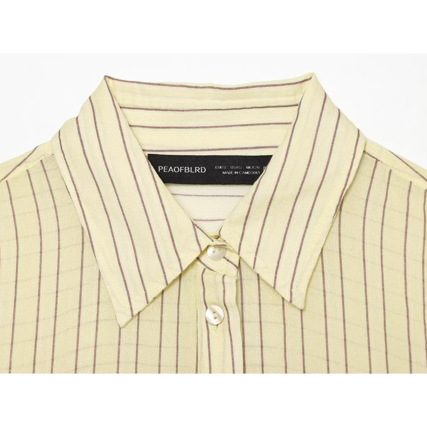 Closeup woven label inside shirt collar, neat neckline stitching