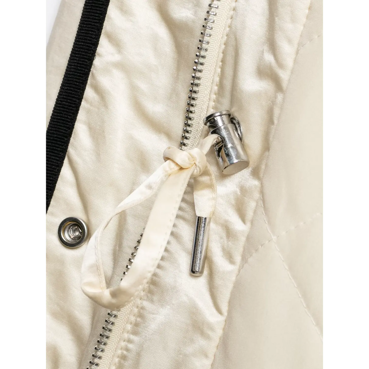 Close-up of inner zipper puller and metal hardware