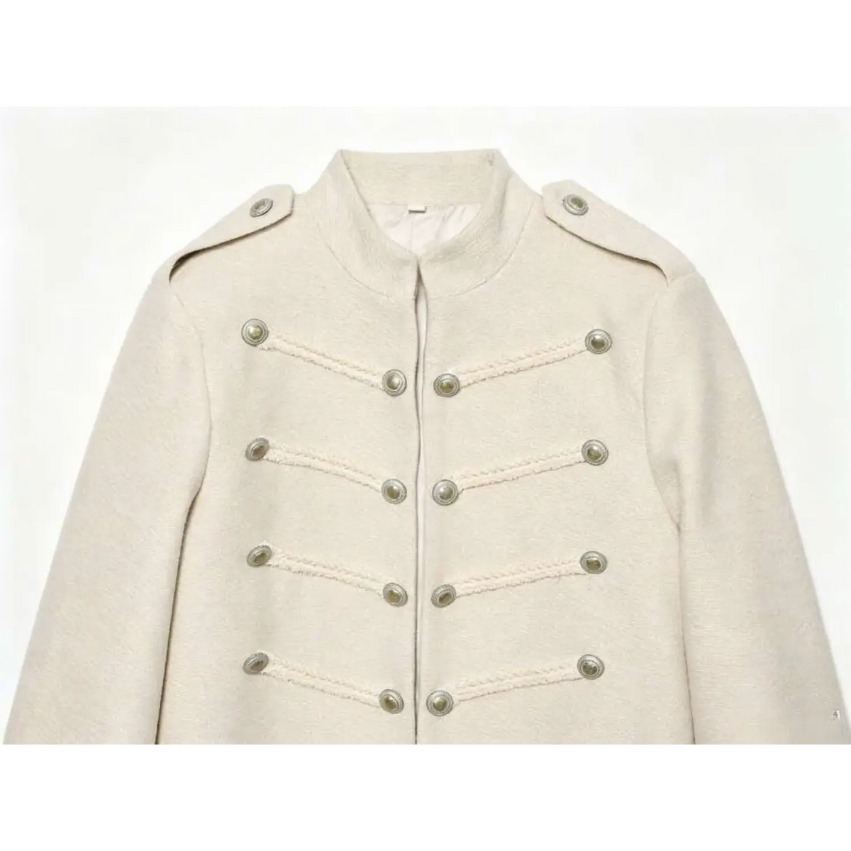 Front view of ivory military style cropped jacket with epaulettes and button trim on white background