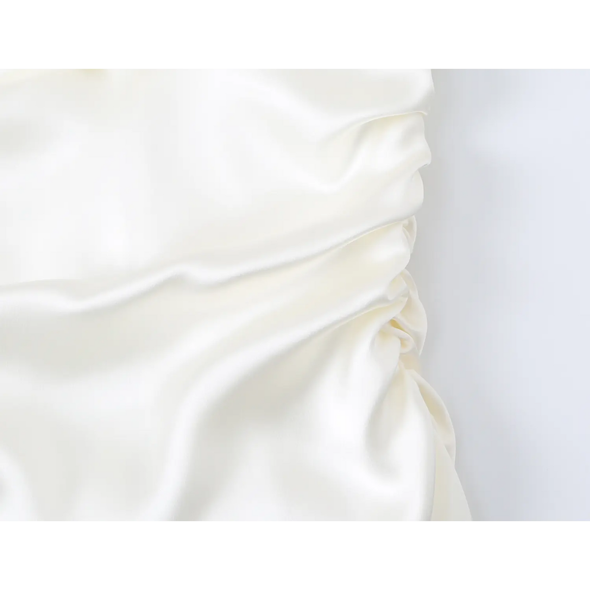 Close-up of ruched waist fabric