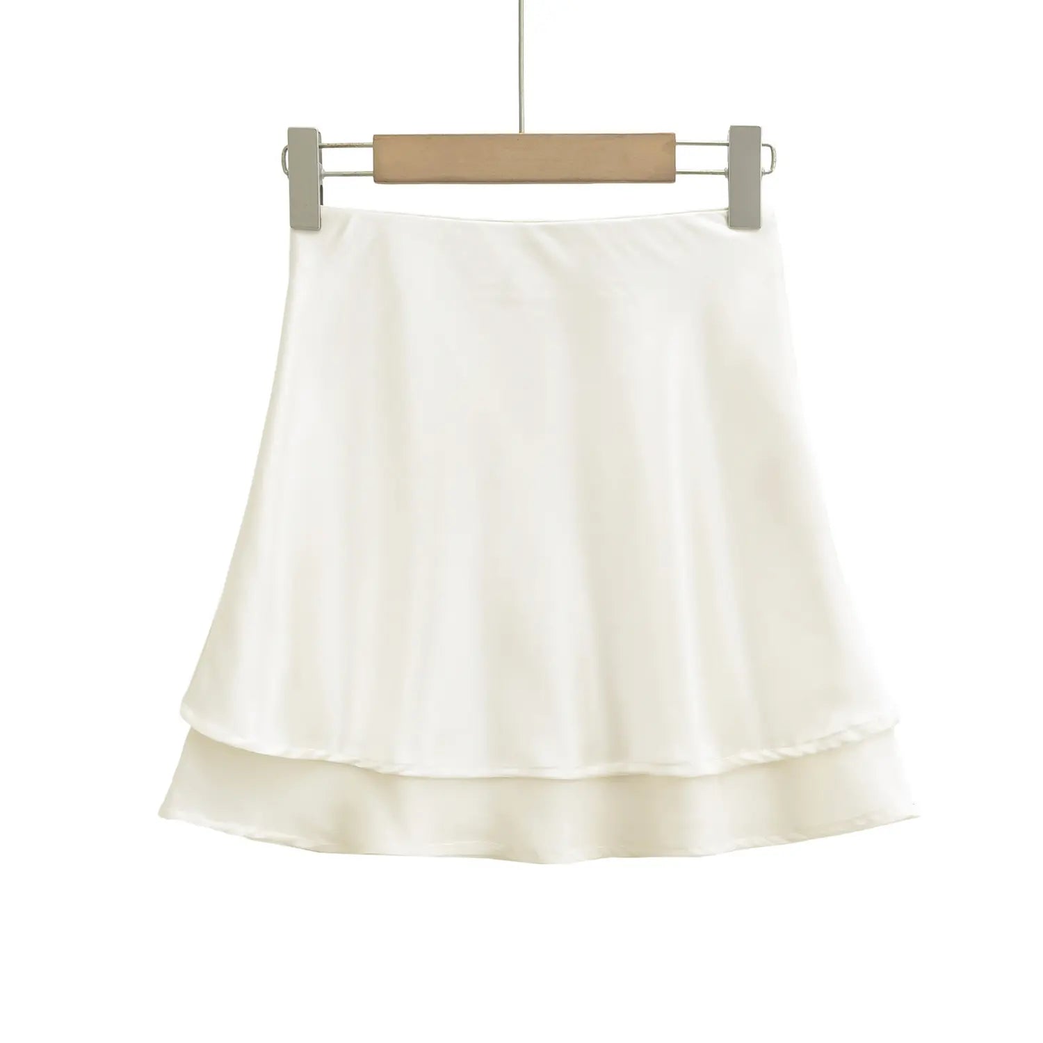 Ivory skirt hem flat macro detail staggered double binding stitching satin & mesh two layer joint wavy edge sewing craft shot