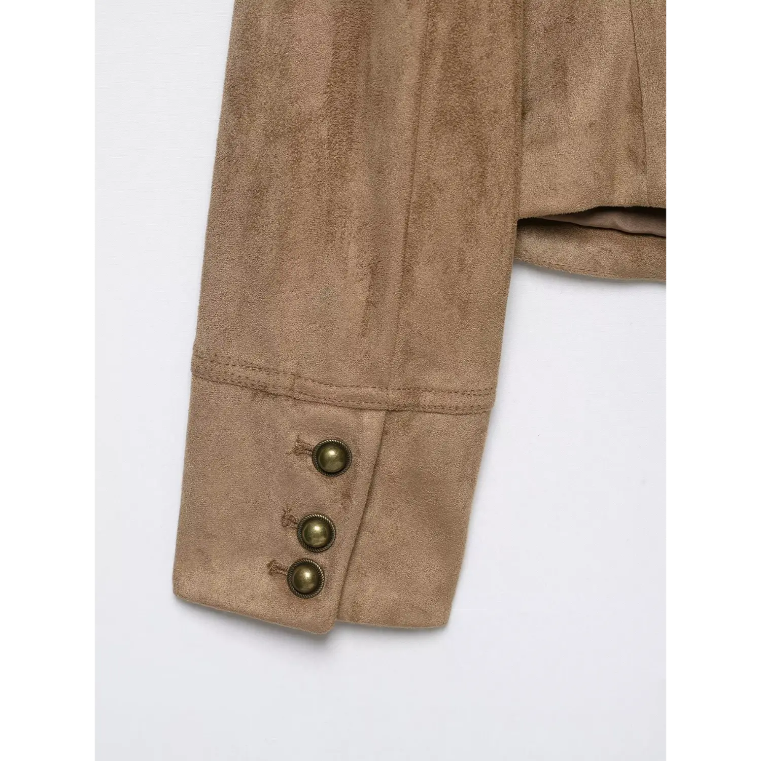 Sleeve cuff close-up, three vintage bronze buttons stitching detail suede cropped outer coat