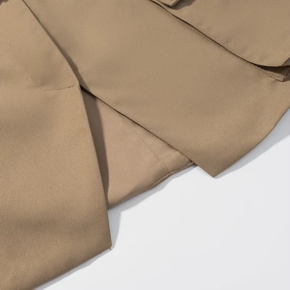 Close-up of khaki front split hem