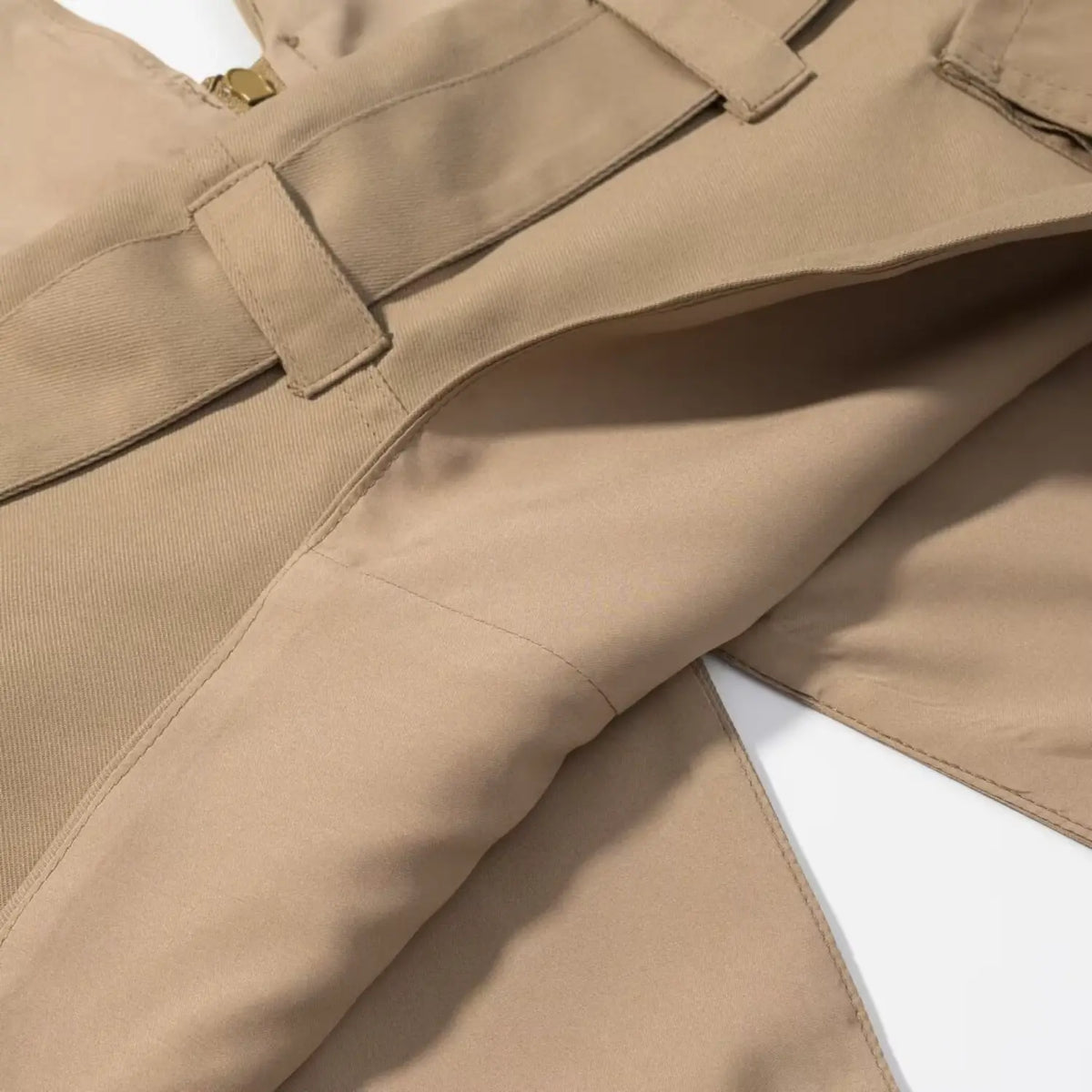 Close-up of khaki lining and belt loop detail