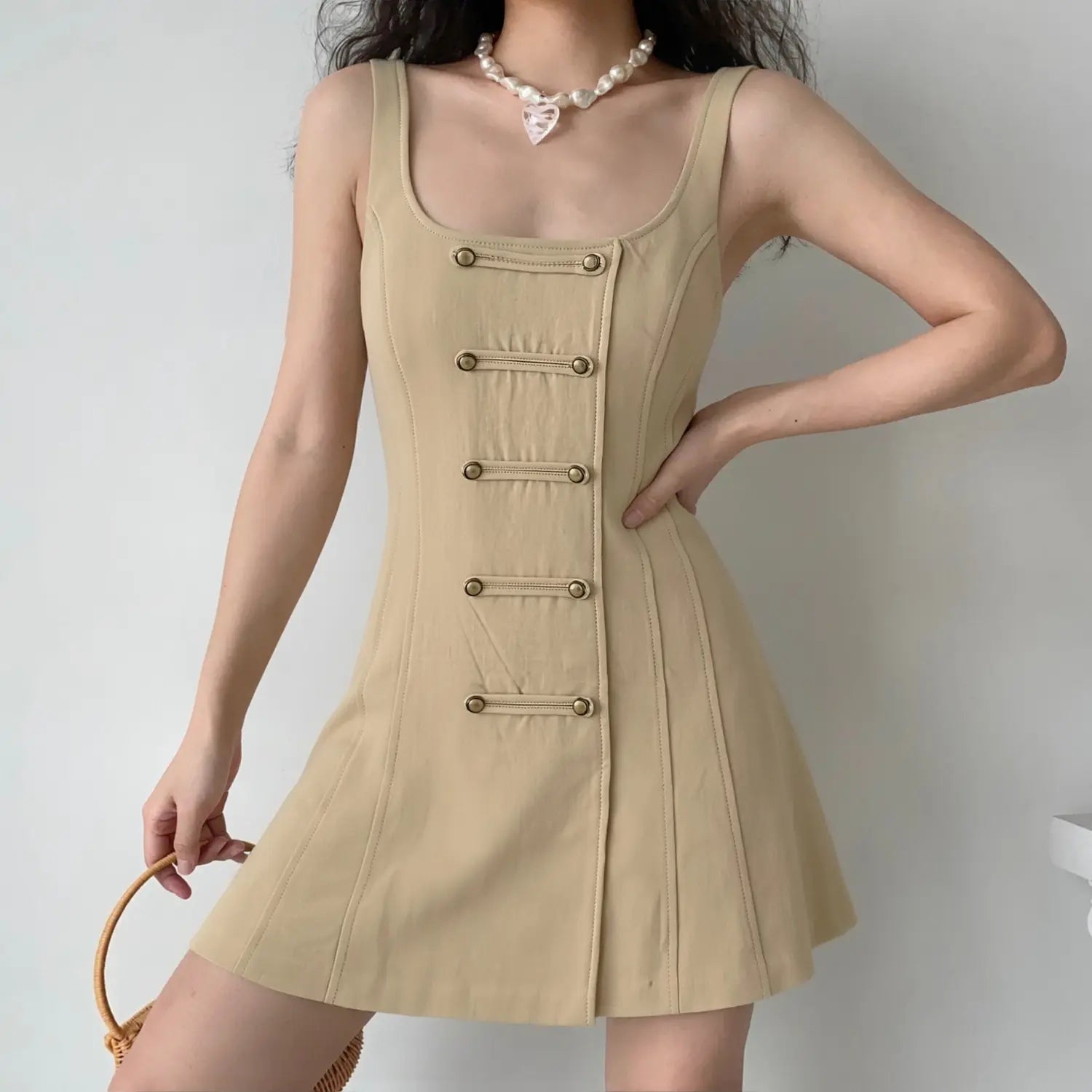 Woman model wearing khaki square neck brass button corset cami mini dress casual daily outfit
