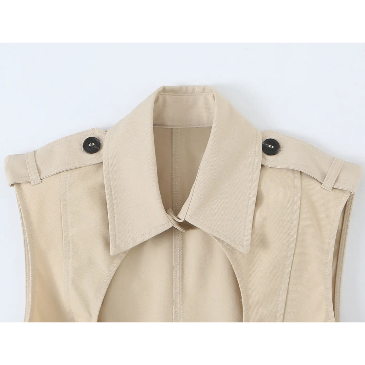 Close-up of pointed collar and epaulette button detail
