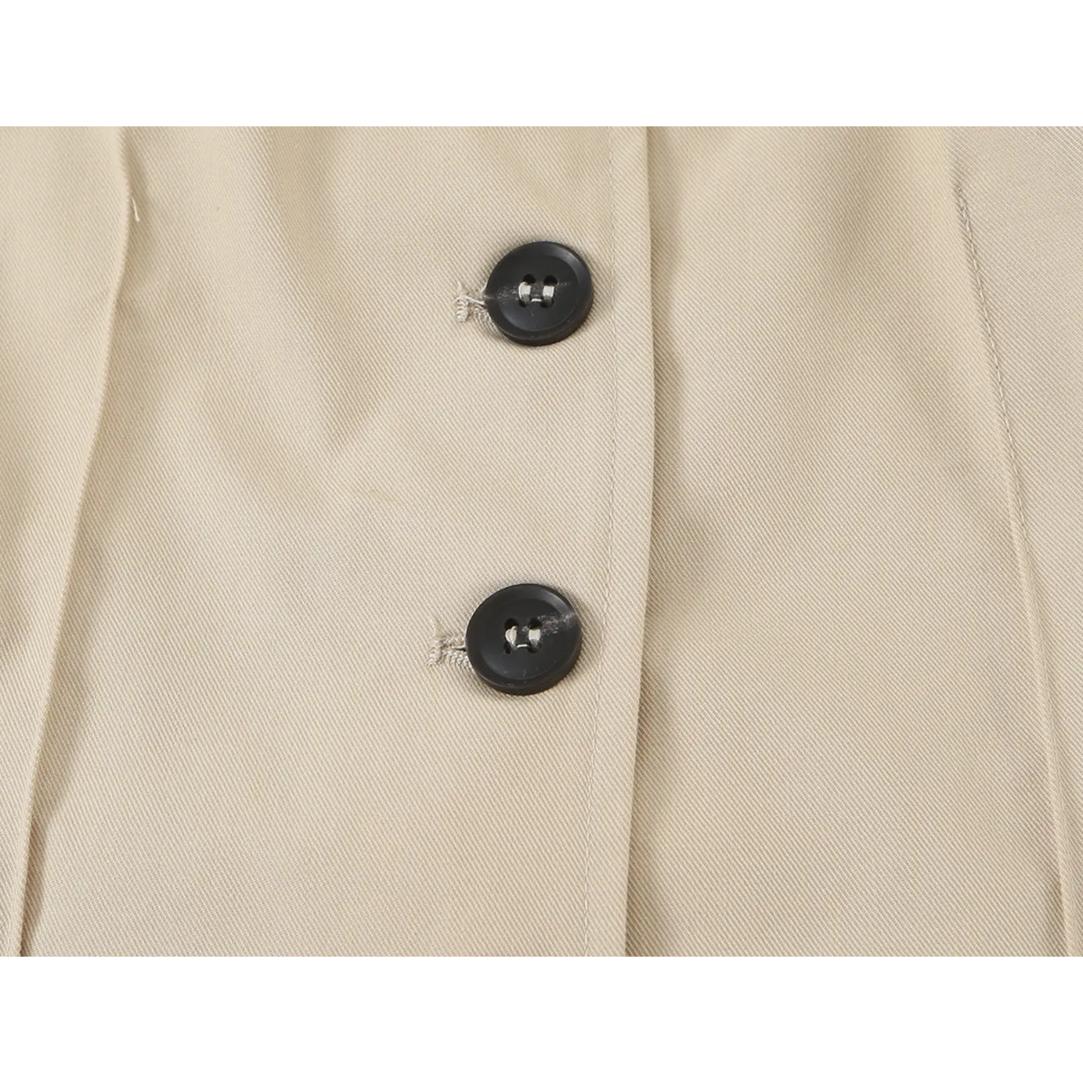 Close-up of black front buttons