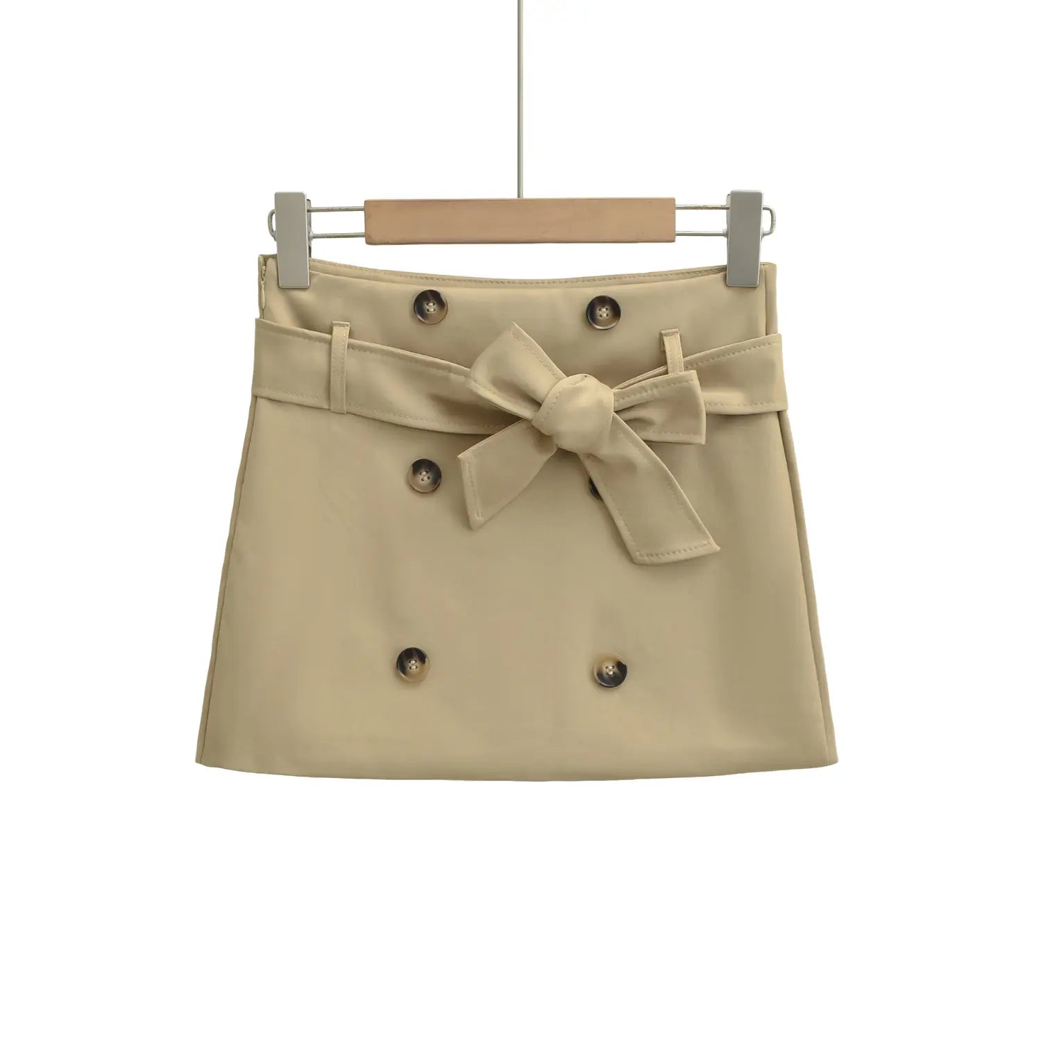Khaki double-breasted bow belt a-line mini skirt front hanger plain white flat lay, high waist removable matching fabric bow tie strap symmetrical horn buttons slim a-line short skirt main product shot