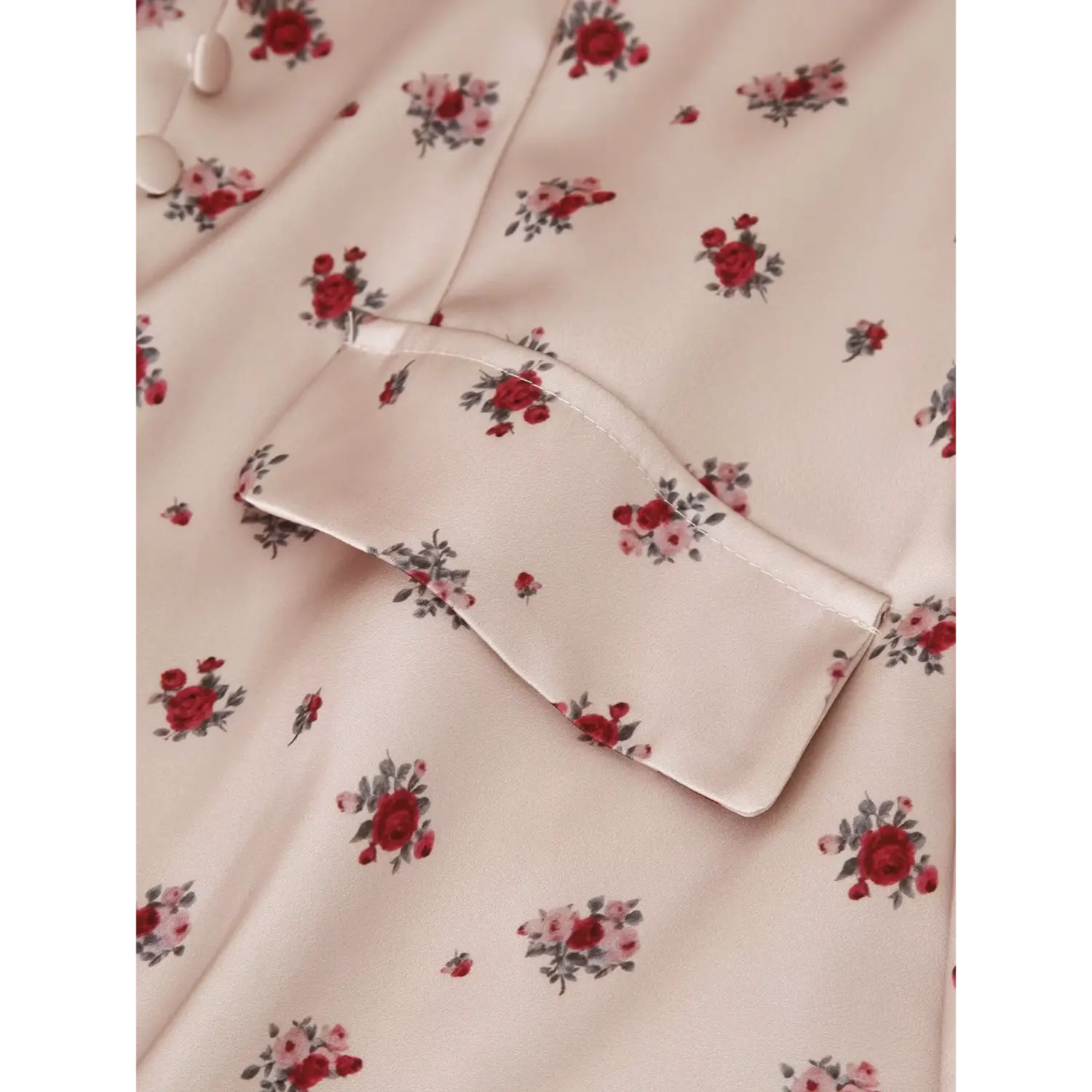 Close‑up decorative fake pocket detail on khaki ditsy rose floral maxi dress