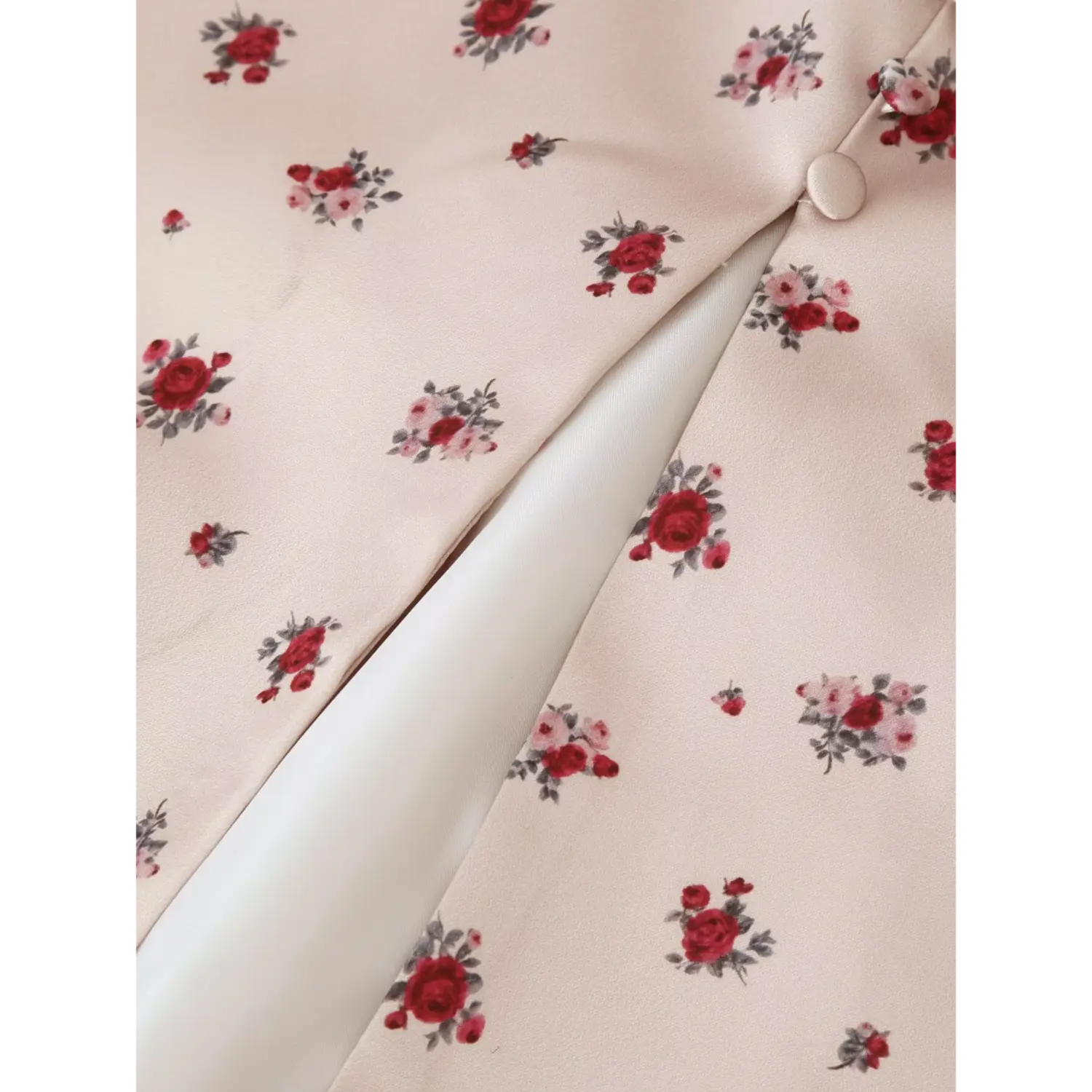 Close‑up front slit and inner lining of khaki ditsy rose floral maxi dress