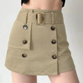 Khaki tortoise buckle belt workwear a-line mini skirt half body indoor model shot, high waist leg-lengthening cut asymmetrical double horn buttons square tortoise belt buckle matched with cropped top commuter cool girl outfit display