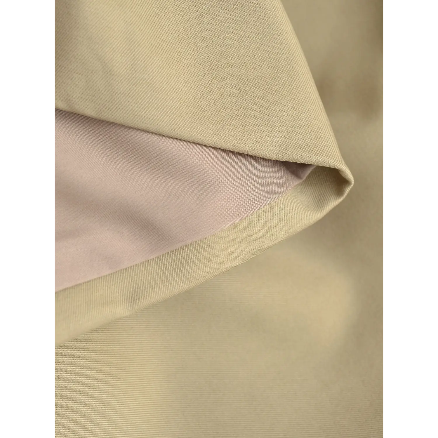 Khaki twill mini skirt outer fabric & pink lining macro flat close-up, stiff wrinkle-resistant suit twill + smooth light pink lining double overlock binding white background craft shot