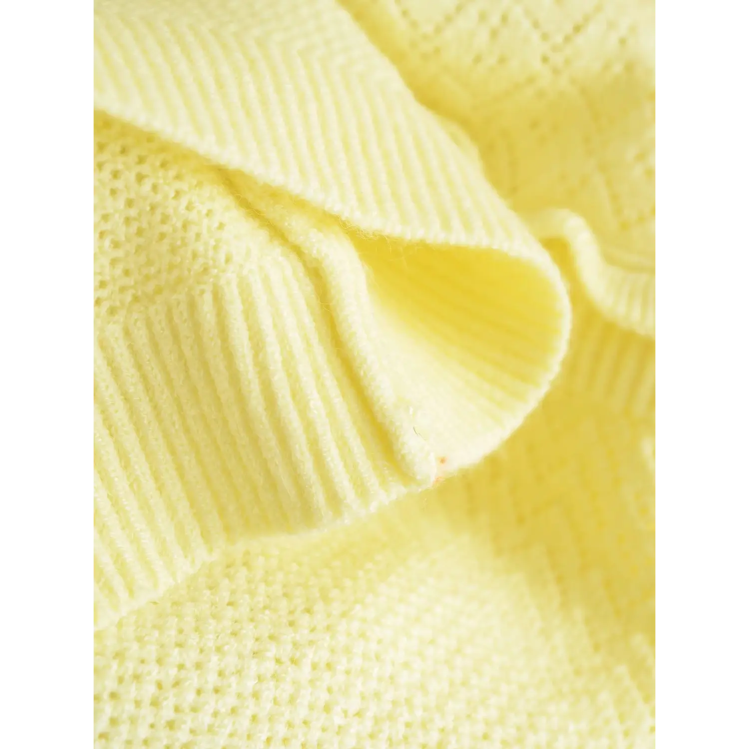 Folded closeup showcasing lightweight breathable hollow knit texture
