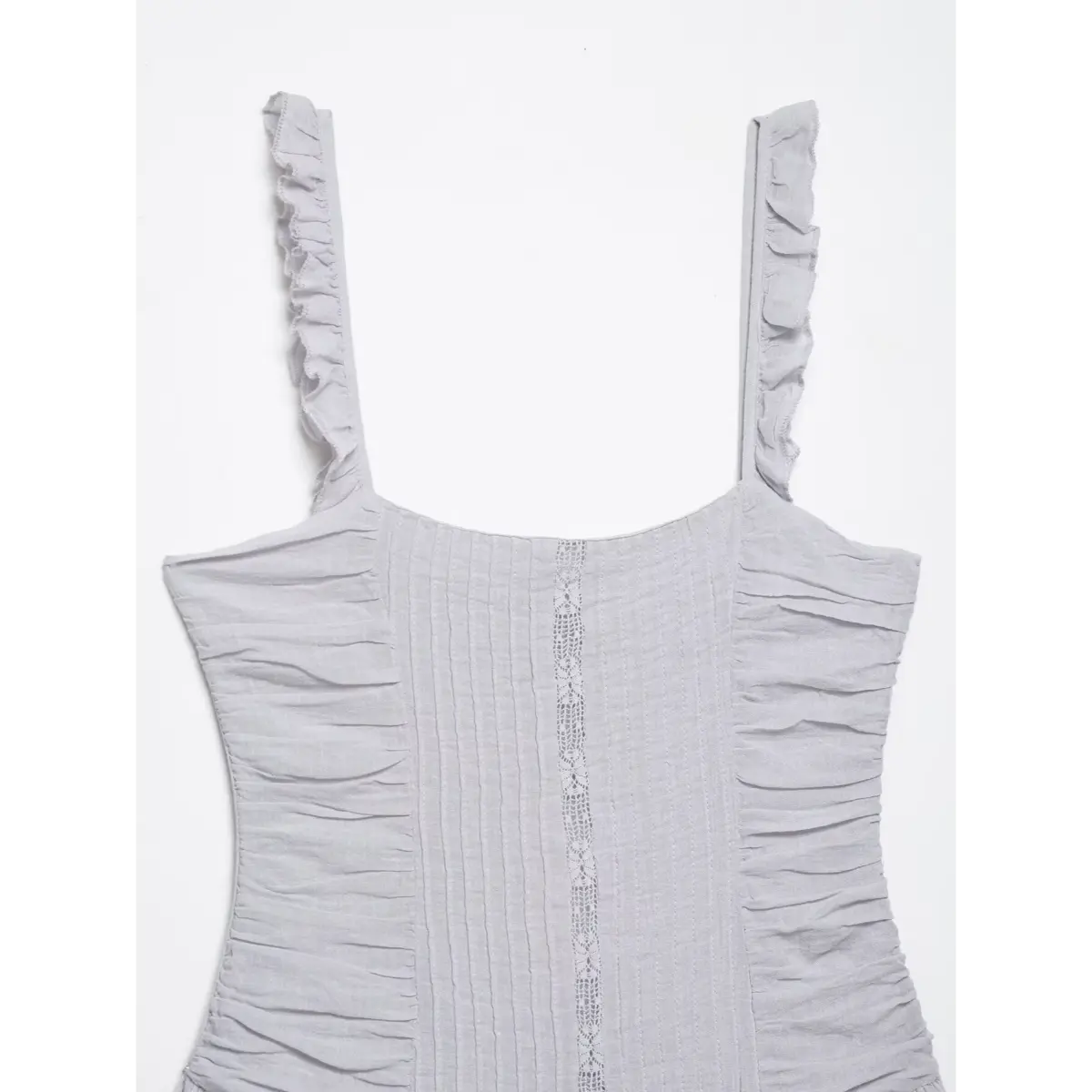 Close-up of the central lace panel and ruched bodice on a gray cami dress, highlighting the intricate stitching.