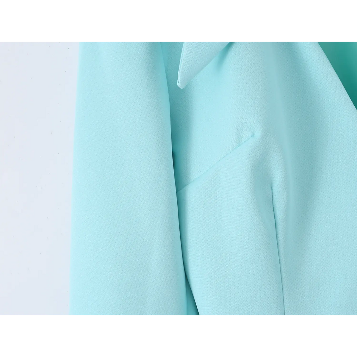 Close-up of waist princess seam and tailored fit