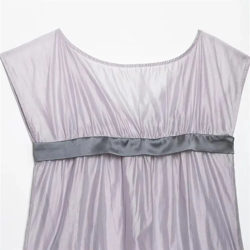 Closeup back round crew neck, full elastic gathered ruched bust, uniform stretch shirring workmanship on back upper bust