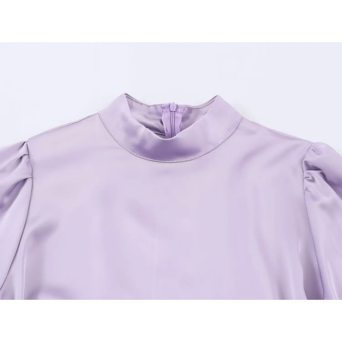 Close-up of mock neck and back neck zipper
