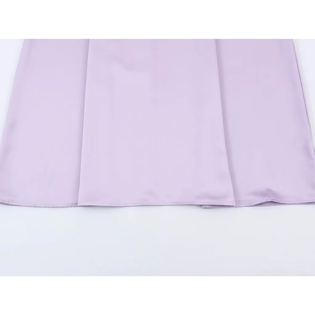 Close-up of skirt panels and hem stitching