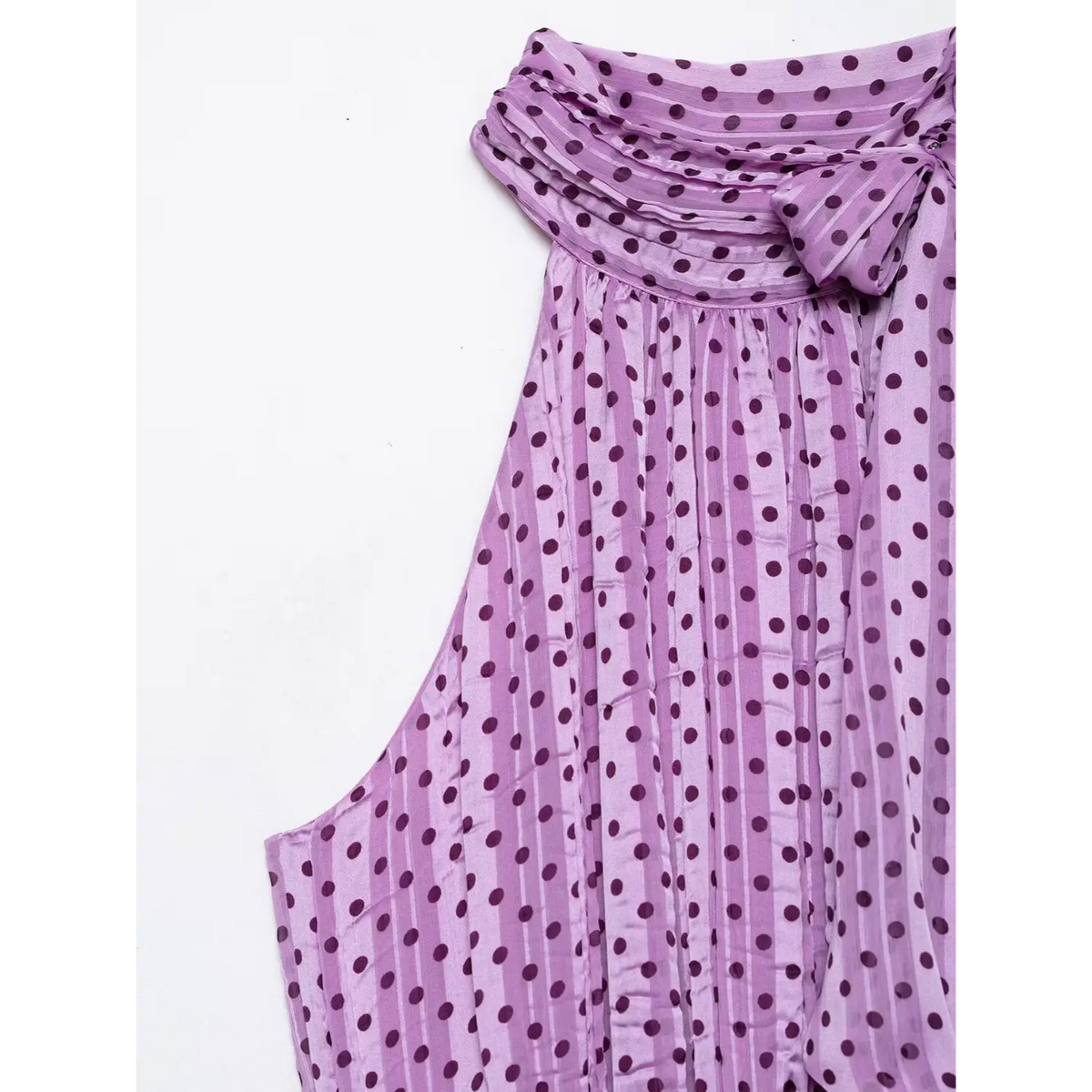 Close‑up of ruffled halter neck and tie detail