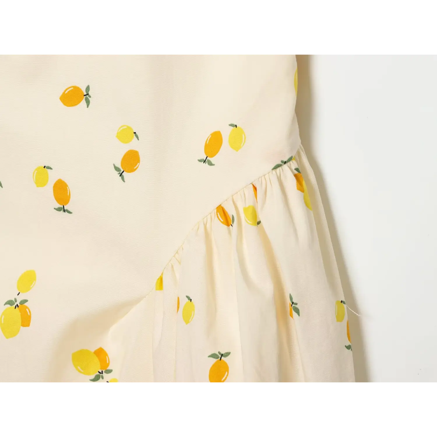 Detail of gathered waist transition to flowy skirt