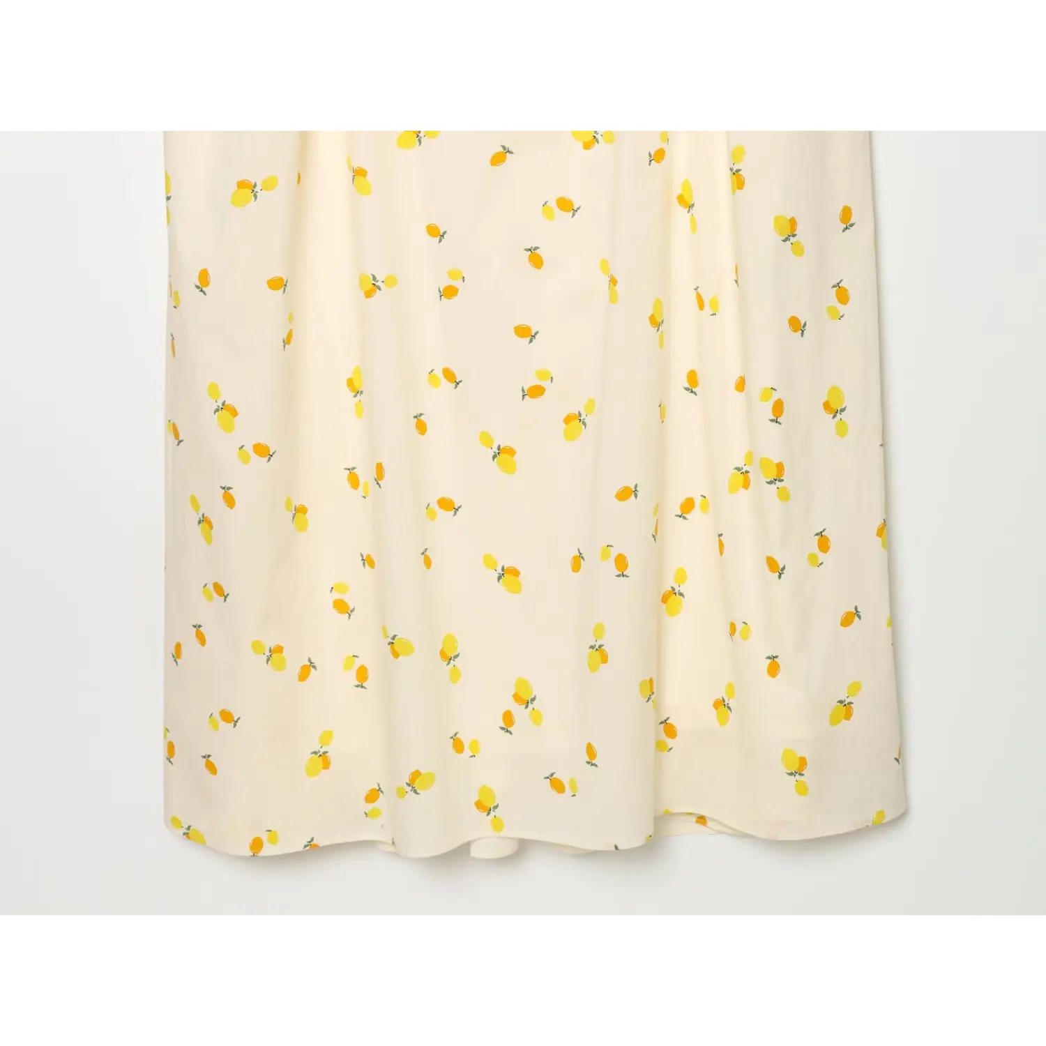 Full view of flowy midi skirt with lemon print