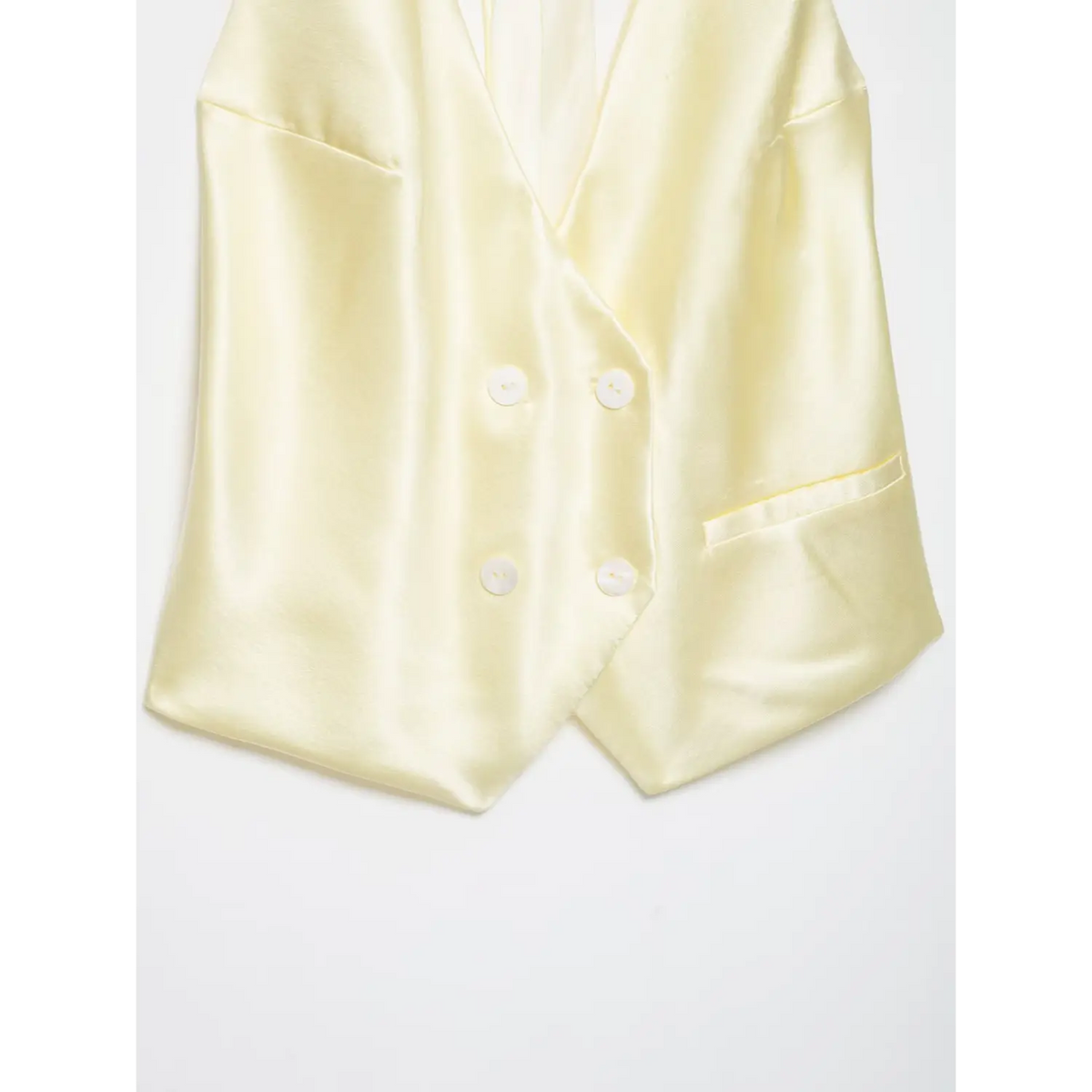 Close-up of pointed hem and welt pocket
