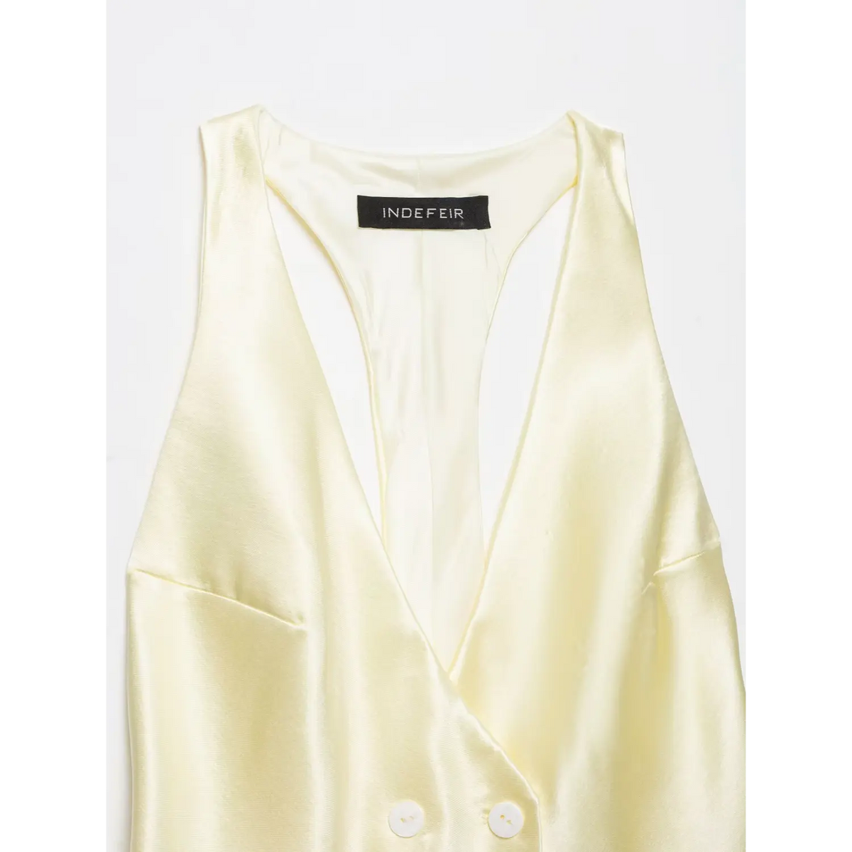 Close-up of back neckline and inner label