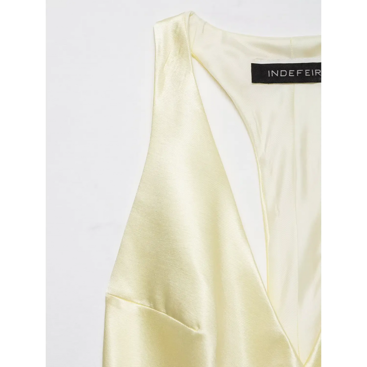 Close-up of shoulder strap and brand label