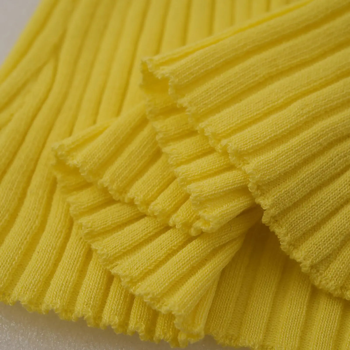 Close-up of vertical rib knit folds