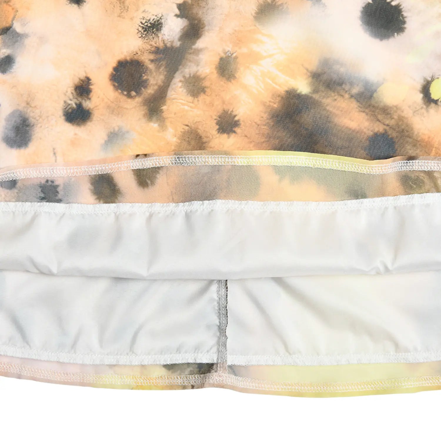  Hem and inner lining detail shot of gradient cheetah print spaghetti strap mini dress