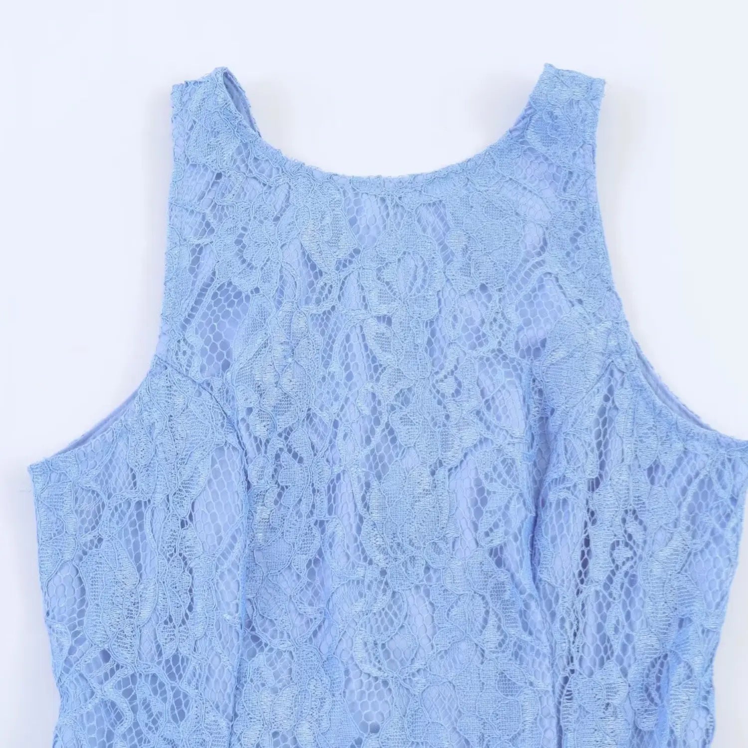 Close-up detail of round neckline and hollow floral lace fabric on light blue sleeveless dress
