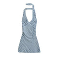 Full front view of the light blue halter dress with navy polka dots, featuring the matching scarf tie.