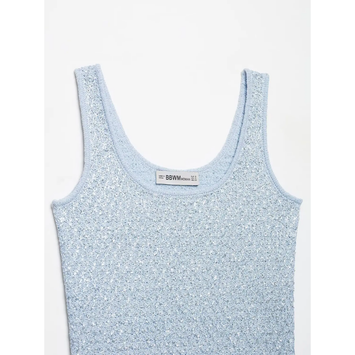 Close-up of scoop neckline and wide straps