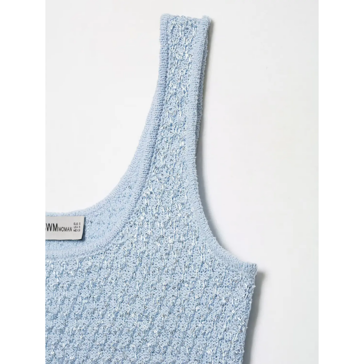 Close-up of sequin detail on shoulder strap