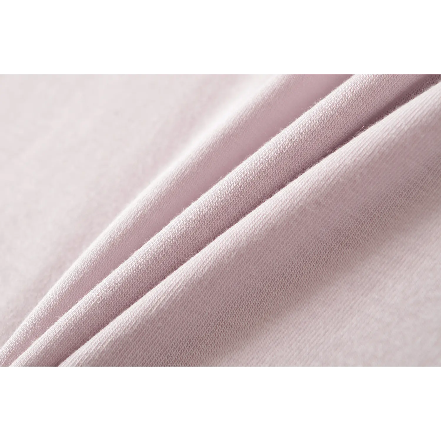 Light lilac fake two long sleeve top modal knit fabric macro flat close-up, soft high stretch fine knit texture breathable skin-friendly fabric white background shot