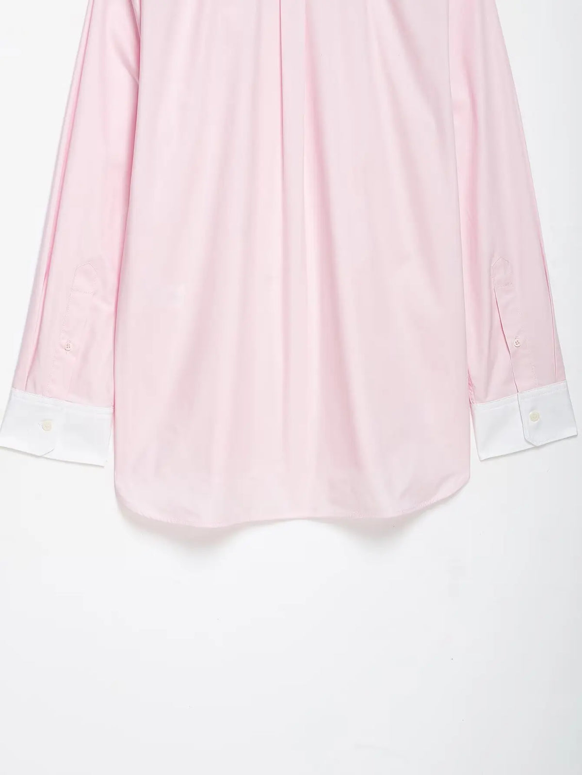 Close-up of back shirt hem and button cuffs