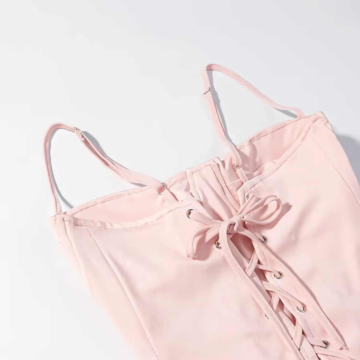 Close-up of lace up back and thin straps