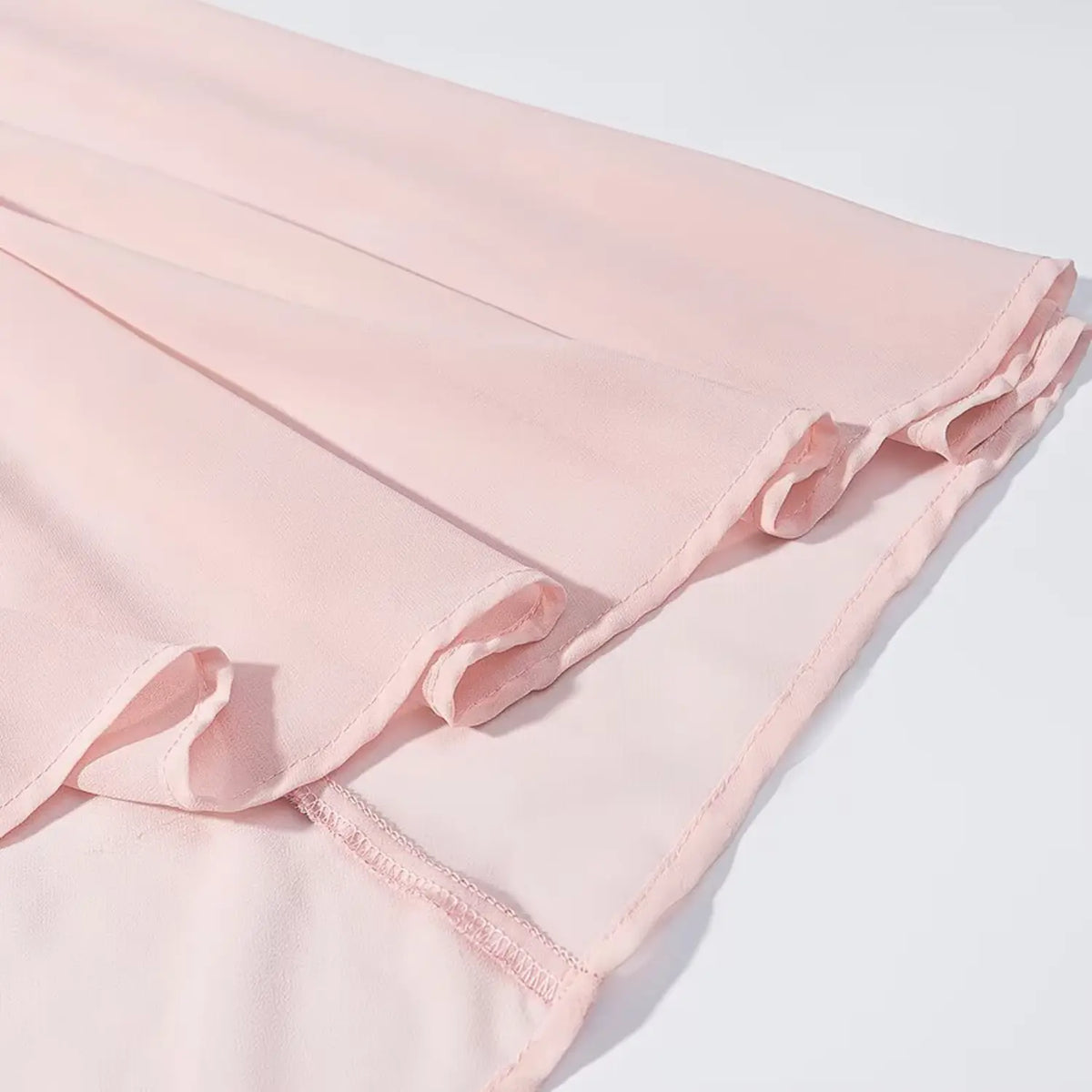 Close-up of skirt hem stitching and lining