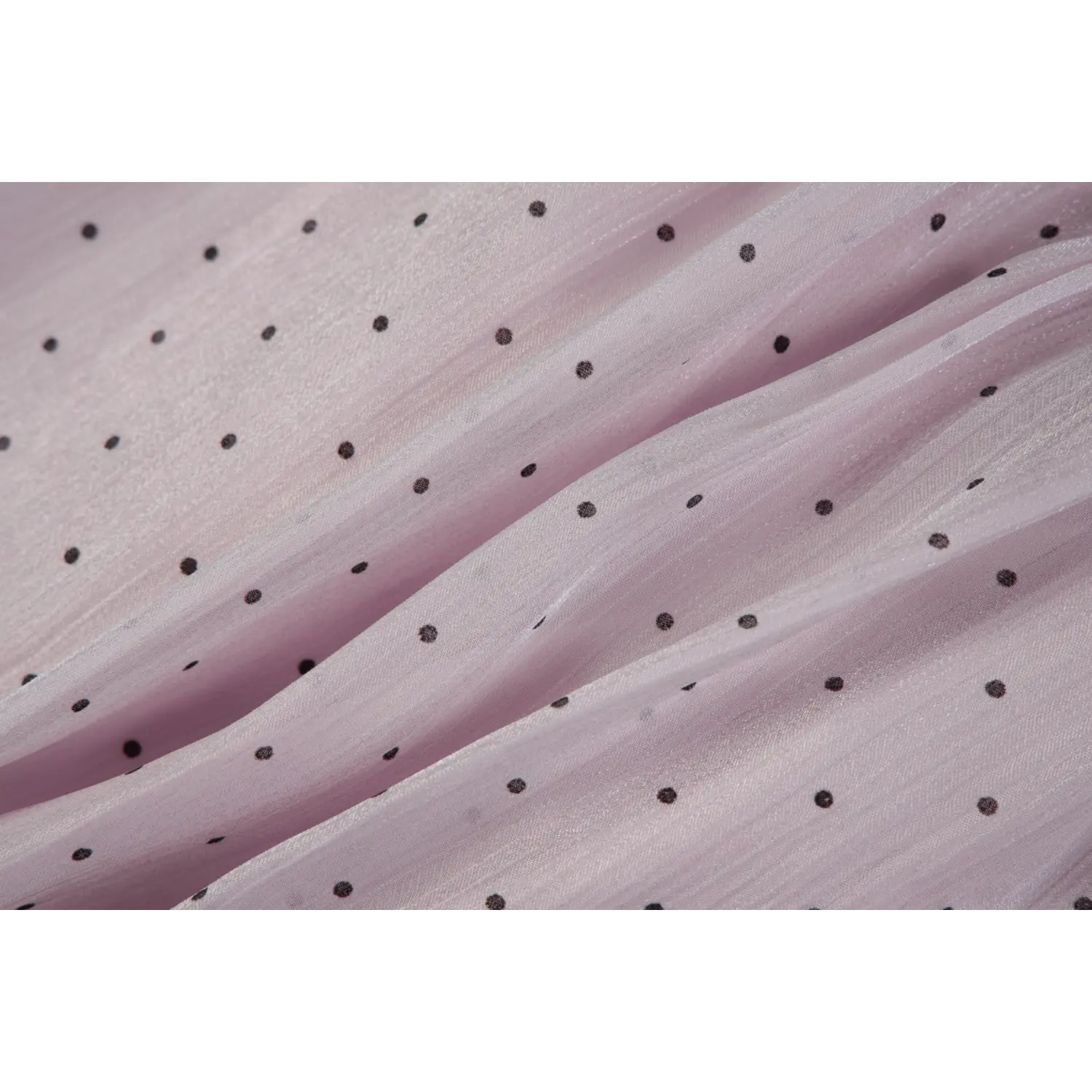 Shimmer crinkle chiffon fabric texture close up polka dot