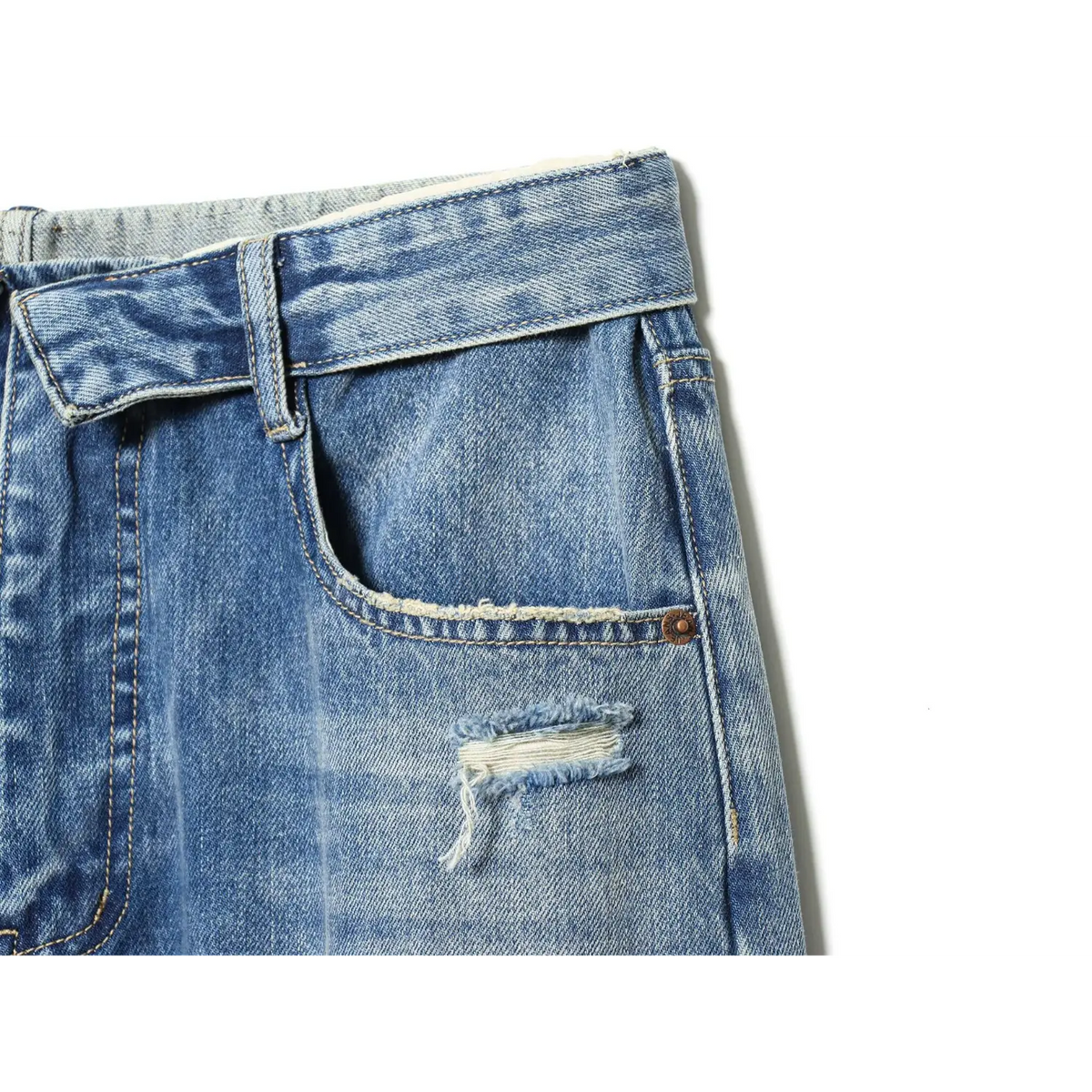 Close-up of front pocket and small distressed patch