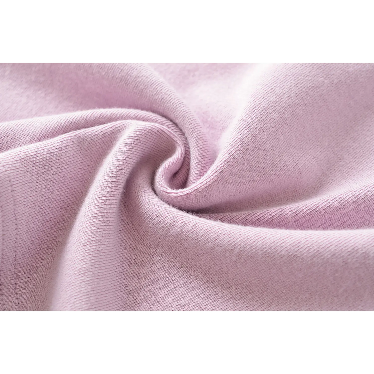 Macro closeup of lilac stretch knit fabric, soft textured knit of women twist front long sleeve top