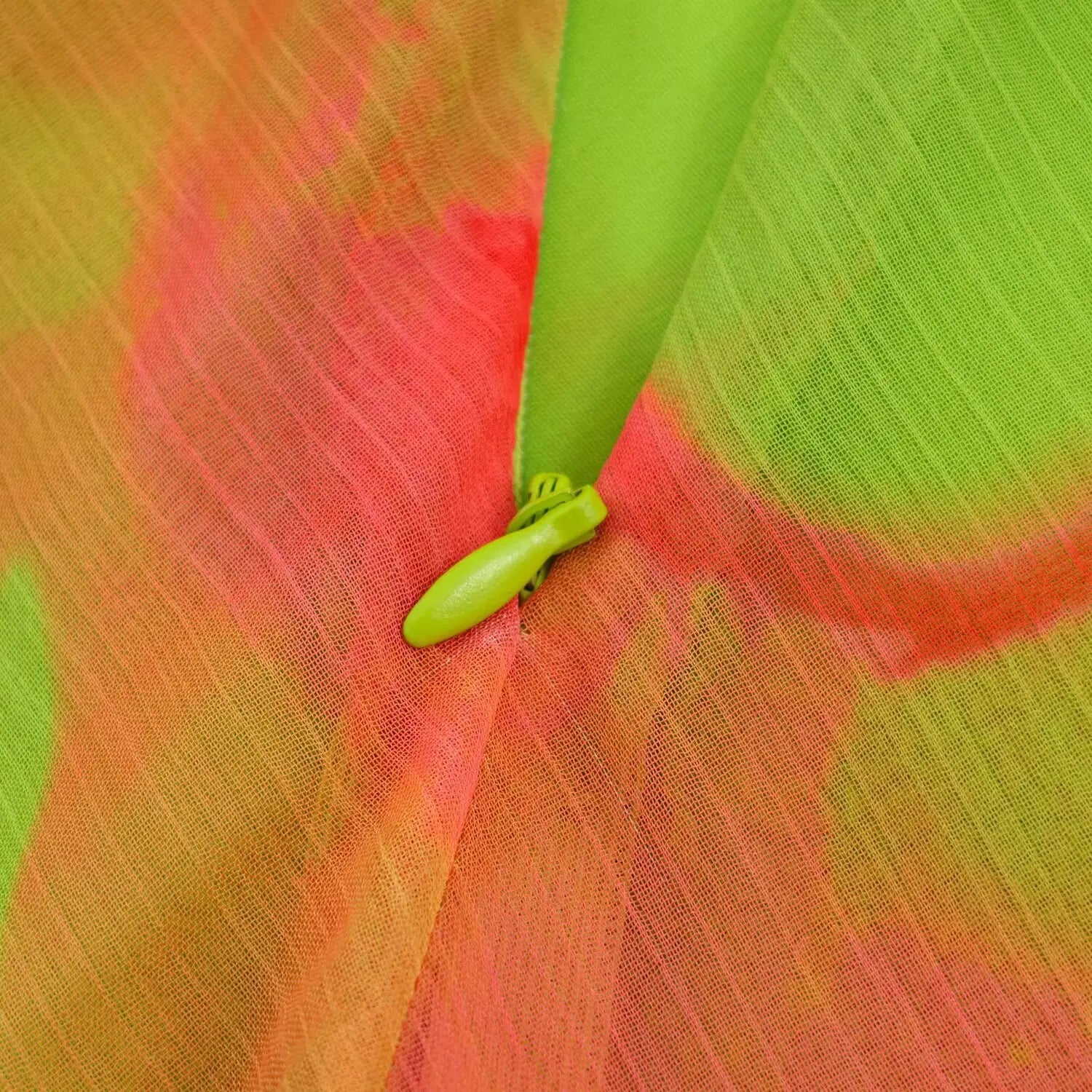 Central back matching lime green invisible zipper, coated teeth & teardrop fabric pull tab blending with printed fabric