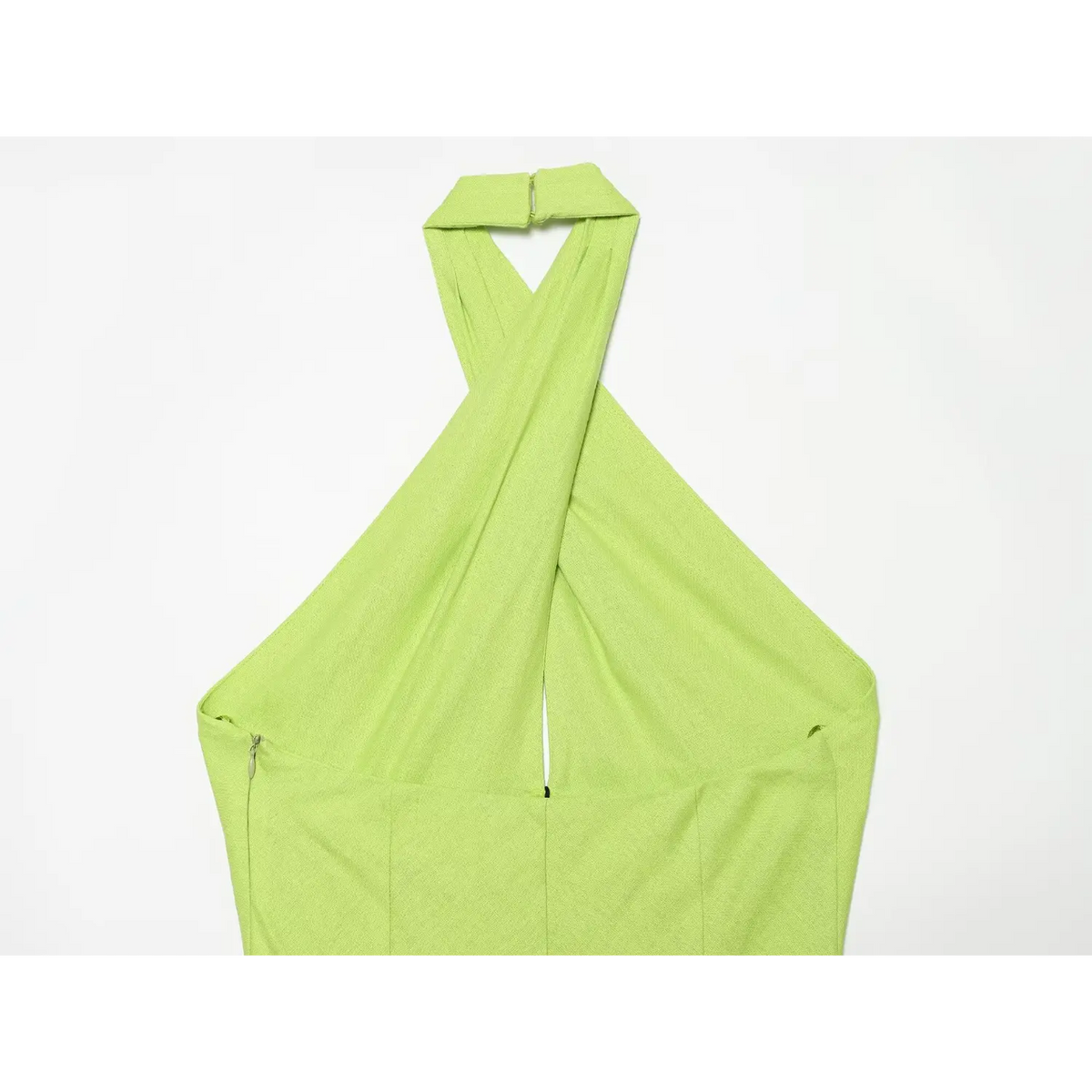 Close-up of lime green back halter and side zip
